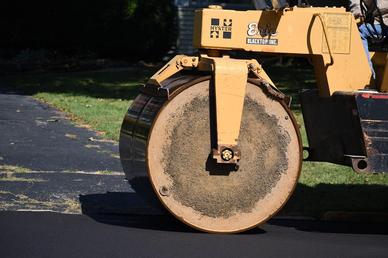The drum of a compaction roller on a paving job